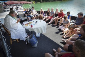 Father Joe Campbell celebrates the annual boat Mass on Norris Lake on June 15. Photo by Deacon Patrick Murphy-Racey