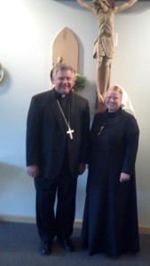 Bishop Richard F. Stika is shown with Sister Paul Mary, RSM, as she entered the novitiate with the Religious Sisters of Mercy of Alma, Mich., on Aug. 15.