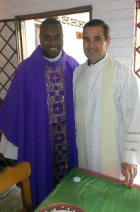 Newly ordained Father Arthur Torres Barona stands with Father Peter Iorio, who attended the ordination in Colombia.