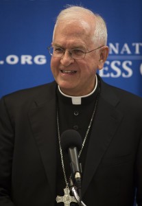 Archbishop Joseph E. Kurtz of Louisville, Ky., president of the U.S. Conference of Catholic Bishops, addresses media at the National Press Club in Washington June 18 about the U.S. perspective on Pope Francis' encyclical on the environment. CNS photo/Tyler Orsburn