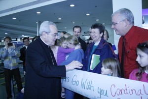 Cardinal Justin Rigali greets diocesan well-wishers at McGhee Tyson Airport as he departed for Rome and the Vatican on Feb. 26. Photo by Dan McWilliams