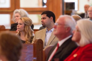 Younger and older couples listen to Bishop Richard F. Stika at a Mass celebrating married couples at St. Mary Church in Athens on Feb. 9. 