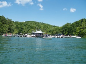 Some 85 people aboard 20 boats and a personal watercraft participated in Father Joe Campbell's annual boat Mass on Norris Lake on June 15. Photo by Scott Dickman