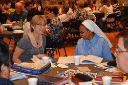 SHARING THE FAITH Participants in the North American Forum’s Beginnings Institute, held June 13-15 at St. Thomas the Apostle Parish in Lenoir City, enjoy a moment while learning more about implementing RCIA programs. Photo by  Jimmy Dee
