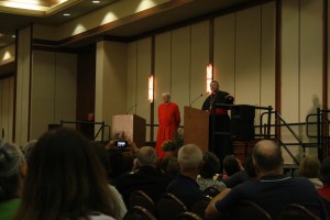 Cardinal Justin Rigali, left, and Bishop Richard F. Stika engage Eucharistic Congress guests during their "Evening Chat" on Sept. 13. Photo by Bill Brewer