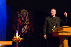 POWER OF GOD Father Robert Barron delivers a rousing talk to thousands of followers who attended the Diocese of Knoxville’s Eucharistic Congress to hear him. Photo by Stephanie Richer