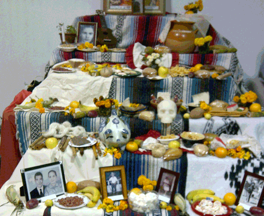 IN MEMORY OF THOSE WHO HAVE GONE BEFORE US This altar is representative of those prepared by Latino families in honor of deceased relatives in celebration of the Day of the Dead, a celebration in preparation for All Saints Day. Courtesy of Lourdes Garza