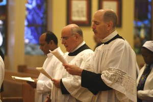 Father Jerry Tully, CSP, right, joins Father Ron Franco, CSP, center, and Father Joseph Thomas, left, at Solemn Vespers for the Consecrated Religious in February 2013.  