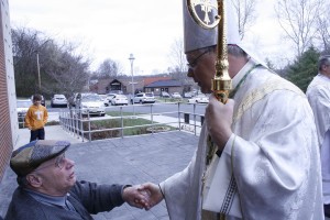 Bishop Richard F. Stika greets Judge Charles Susano following Mass March 19 at Sacred Heart Cathedral. The fifth anniversary of Bishop Stika's ordination and installation as bishop of the Diocese of Knoxville was March 19. Photo by Dan McWilliams