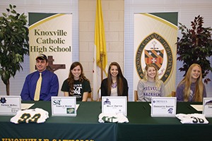 FOUR SIGN ON APRIL 16 Signing for Knoxville Catholic are (from left) Jerome Rehmann, Ryan Henry, Jessica Nix, and Dwight Jessie. Photo by Dan McWilliams