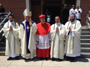Bishop Richard F. Stika and Cardinal Justin Rigali are shown with the diocese's newest deacons, from left, Jesús Guerrero-Rodríguez, Scott Russell and Raymond Powell following their June 14 ordination into the transitional diaconate.