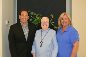Sister Mary Timothea Elliott, RSM, center, Diocese of Knoxville director of christian formation, is shown with EWTN personalities Jim and Joy Pinto at the diocese's RCIA Summer Conference June 21. Photo by Jimmy Dee 