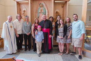 Bishop Richard F. Stika and members of the Elizabeth Siminerio family are shown at the dedication of the Marian chapel at All Saints Church. (Photo by Stephanie Richer)