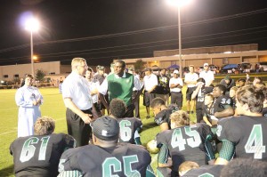 Bishop Richard F. Stika addresses the Notre Dame High School football team following its hard-fought 15-12 loss to Knoxville Catholic High School as Notre Dame football coach Charles Fant and diocesan schools Superintendent Sister Mary Marta Abbott, RSM, look on. Photo by Bill Brewer