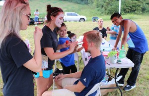 Students who attend Blessed Teresa of Calcutta Catholic Mission in Maynardville take part in face-painting during a fundraising event for a new church. Photo by Bill Brewer