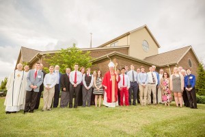 Members of St. Albert the Great Church's 2014 confirmation class and their sponsors are shown with Bishop Stika, Father Chris Michelson and Father Tony Budnick. Photo by Stephanie Richer