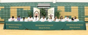 Thirteen seniors from Knoxville Catholic High School received full-ride college scholarships. Eleven of the 13 students took part in an academic signing day at the school on May 5. Photo by Dan McWilliams Photo by Dan McWilliams