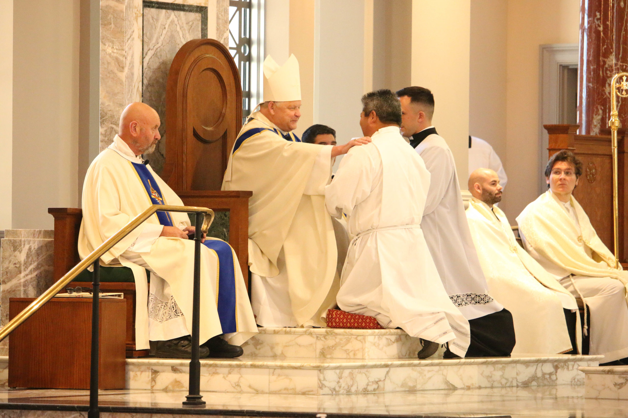 Bishop Stika installs permanent deacon candidates as acolytes ...