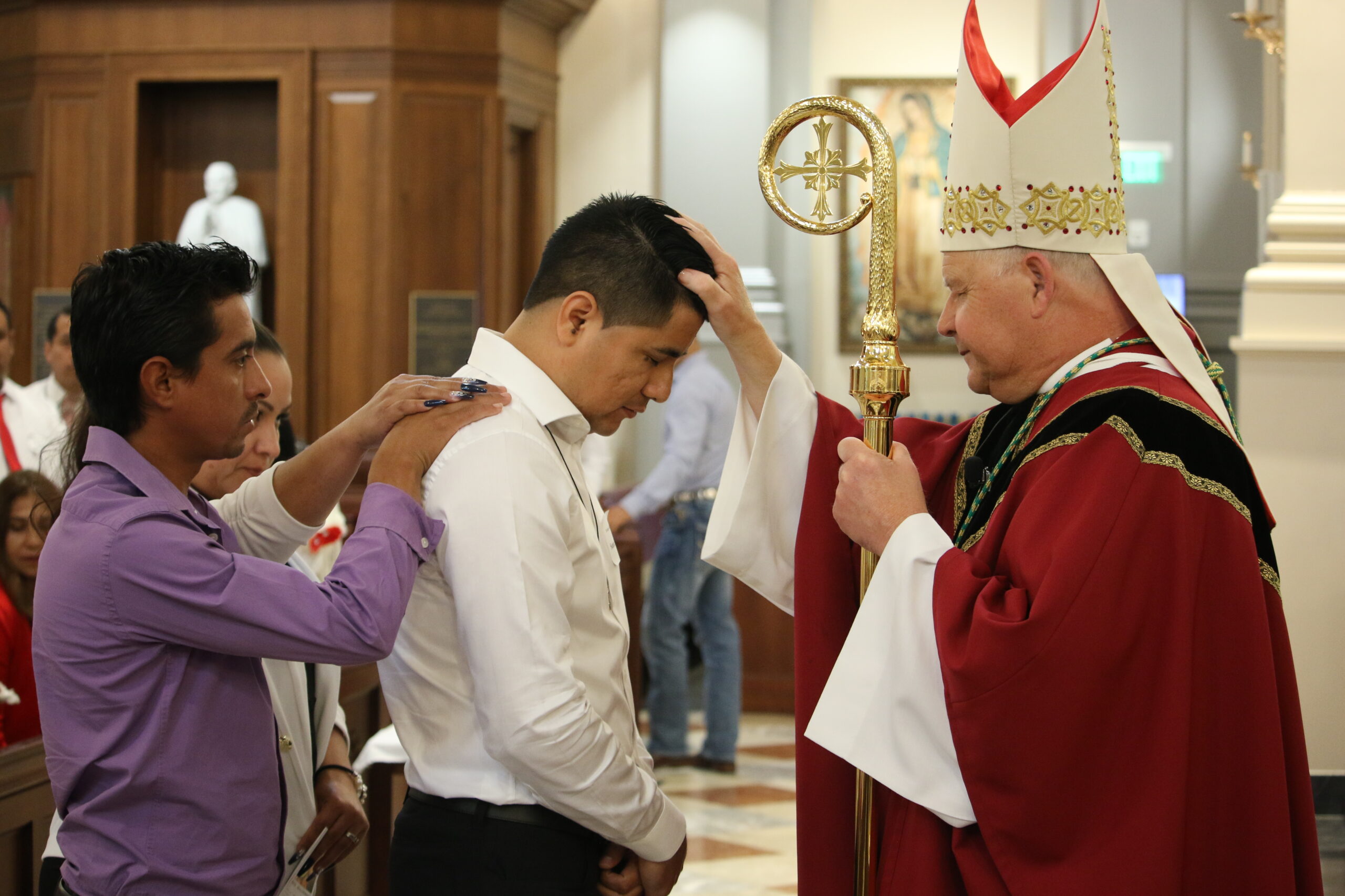 Bishop Stika confirms 53 during adult confirmation | East 