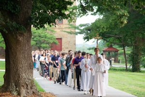 Young people in eucharistic procession 